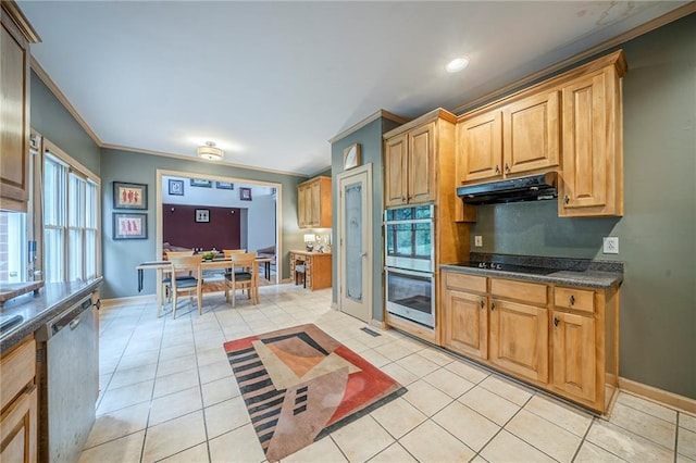 kitchen with under cabinet range hood, light tile patterned floors, crown molding, dark countertops, and appliances with stainless steel finishes