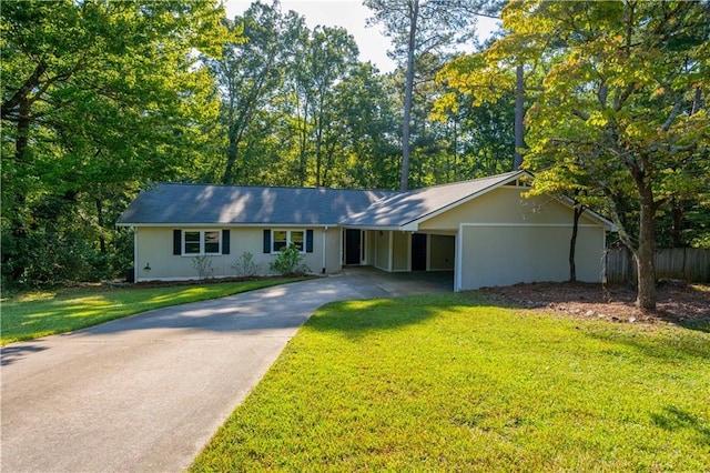 ranch-style home featuring a front lawn and a carport