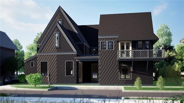 back of house with a balcony