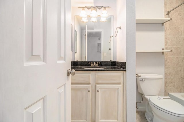 1445 Monroe Dr NE Unit F10, Atlanta, GA 30324 - bathroom featuring vanity, toilet, and washtub / shower combination