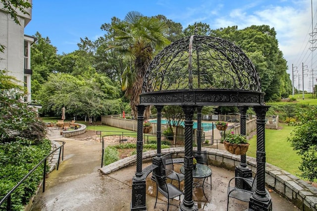 1445 Monroe Dr NE Unit F10, Atlanta, GA 30324 - view of patio with view of wooded area
