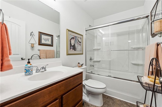 full bathroom with toilet, combined bath / shower with glass door, and vanity