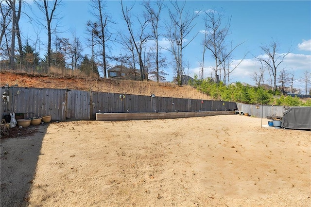 view of yard featuring fence