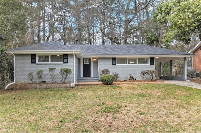 ranch-style house with brick siding, a front yard, crawl space, a carport, and driveway