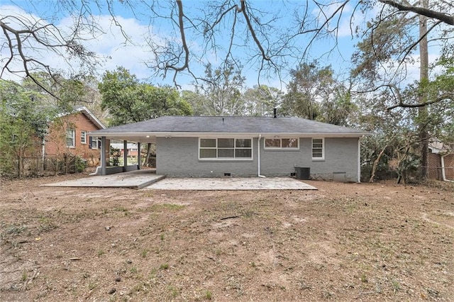 back of house featuring central AC unit, crawl space, a patio area, and fence