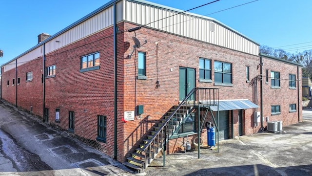 view of building exterior featuring central AC