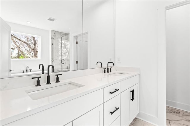 490 Hammons Way, Atlanta, GA 30315 - bathroom featuring marble look tile flooring, a marble finish shower, and double vanity