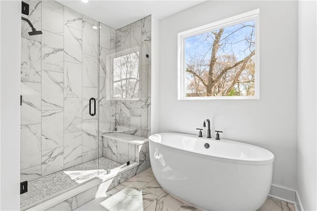 490 Hammons Way, Atlanta, GA 30315 - full bathroom with marble look tiles, a freestanding bath, and a marble finish shower