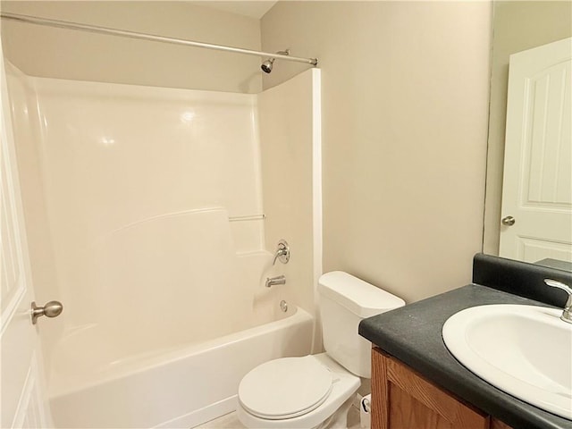 full bathroom featuring vanity,  shower combination, and toilet