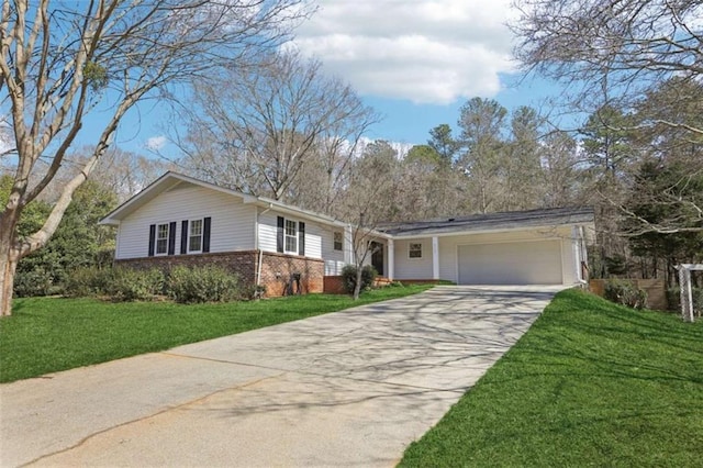 single story home with a front yard and a garage