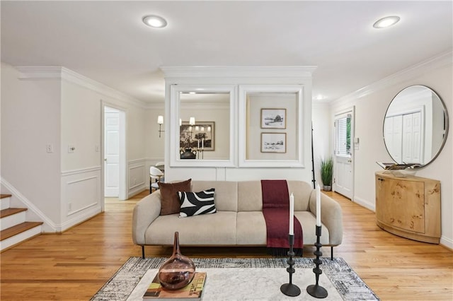 1634 Ponce De Leon Ave NE Unit 514, Atlanta, GA 30307 - living room featuring crown molding, light wood-style floors, recessed lighting, and stairs