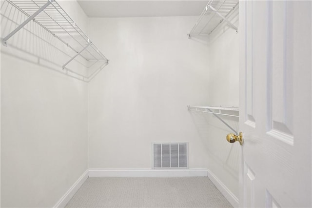 1634 Ponce De Leon Ave NE Unit 514, Atlanta, GA 30307 - walk in closet featuring carpet