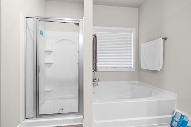 2046 Westbrook Rd, Commerce, GA 30530 - full bathroom featuring a bath and a shower stall
