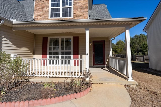 property entrance featuring covered porch