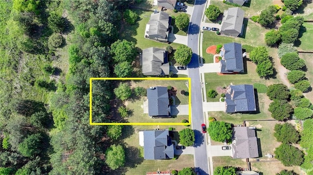 aerial view of residential area featuring property parcel outlined