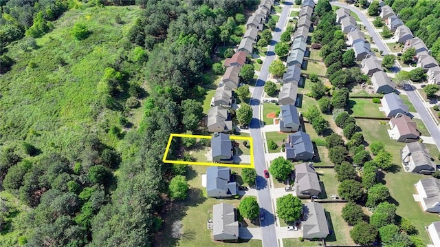 aerial perspective of suburban area featuring property boundaries highlighted