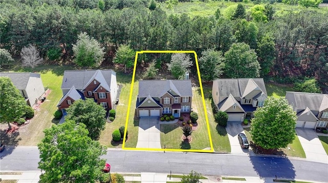 aerial perspective of suburban area with property boundaries highlighted