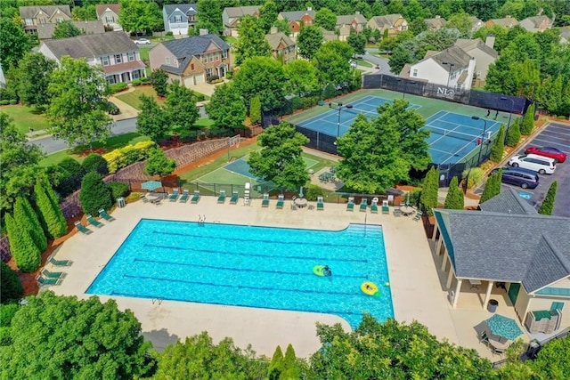 aerial view of residential area with a pool area