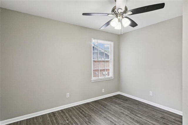 spare room with hardwood / wood-style flooring and ceiling fan