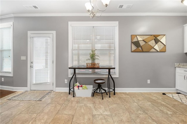 dining area with visible vents and ornamental molding