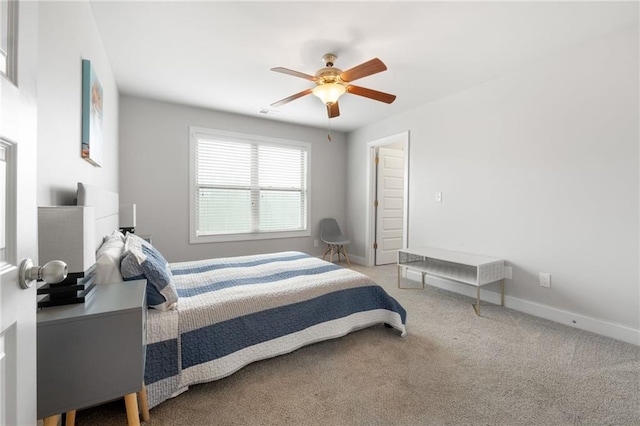 bedroom featuring baseboards, carpet, and a ceiling fan