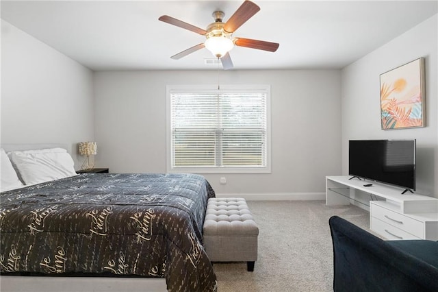 bedroom featuring baseboards, carpet floors, visible vents, and ceiling fan