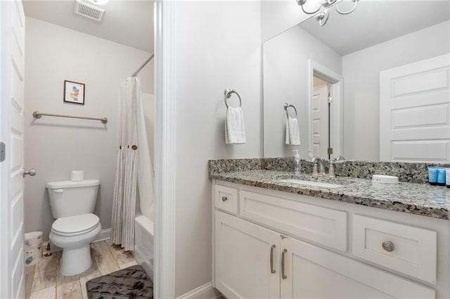 full bath with vanity, baseboards, visible vents, toilet, and shower / tub combo with curtain