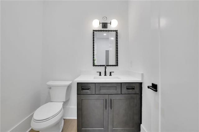 380 Hillcrest View Dr, Suwanee, GA 30024 - half bath with baseboards, toilet, and vanity