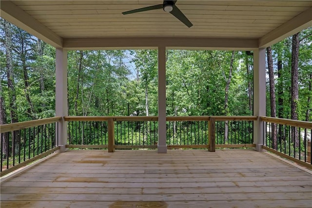 380 Hillcrest View Dr, Suwanee, GA 30024 - wooden deck with a ceiling fan and a view of trees