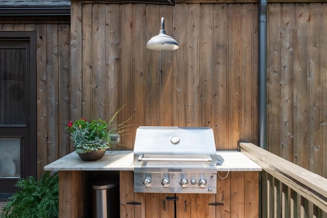 view of patio featuring a grill