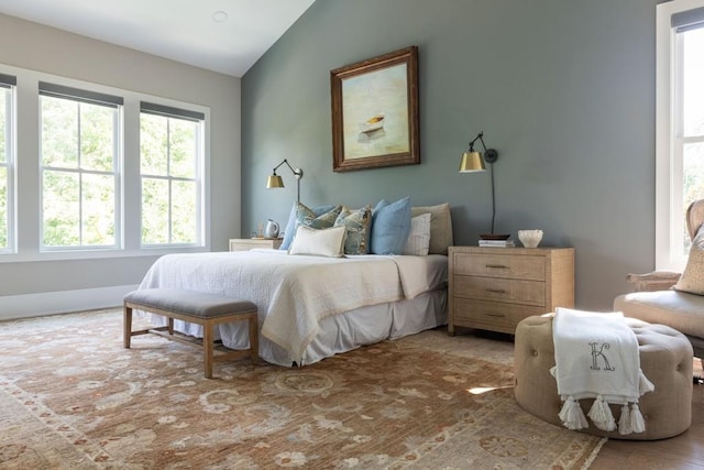 bedroom featuring lofted ceiling