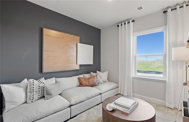 living room with light colored carpet