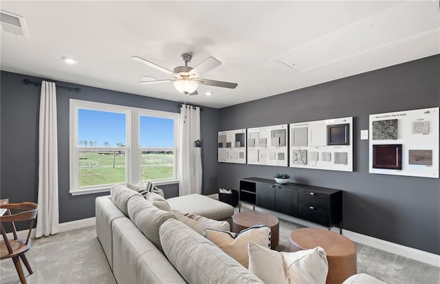 living room with light carpet and ceiling fan