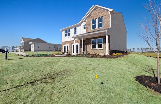 view of front of house featuring a front lawn