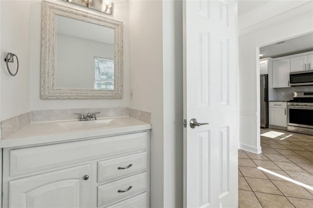 bathroom featuring vanity and tile patterned floors