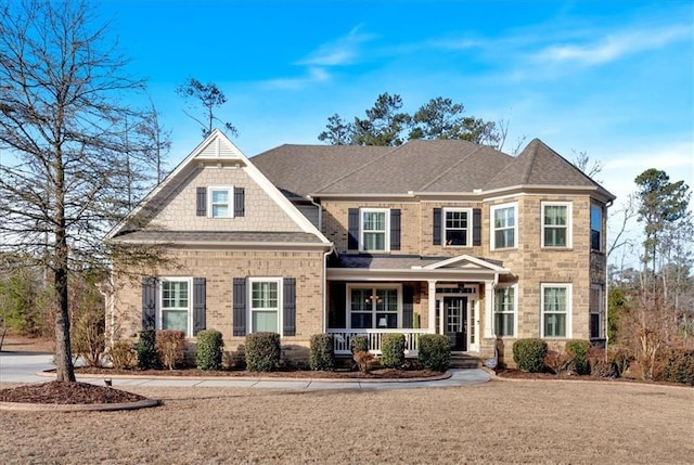 view of front of property featuring covered porch