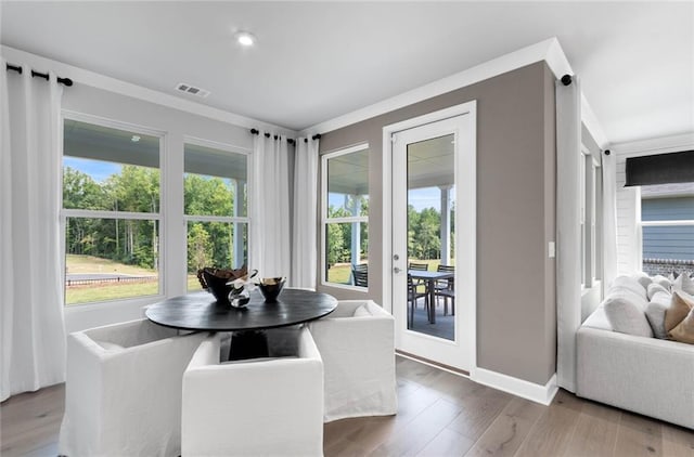 dining room with hardwood / wood-style flooring