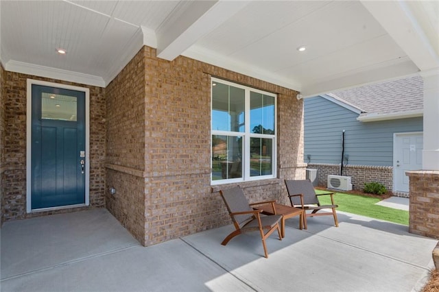 doorway to property featuring a patio area