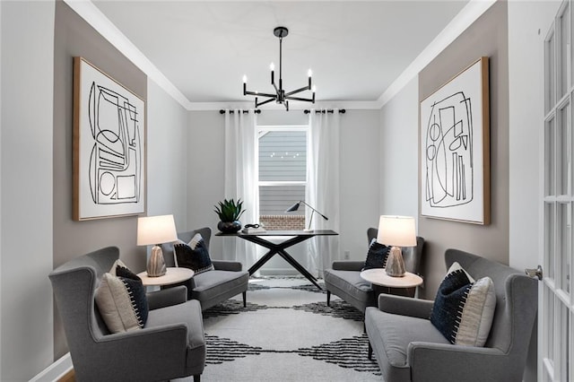 living area featuring an inviting chandelier and crown molding