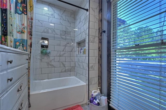 full bath featuring shower / bath combo with shower curtain