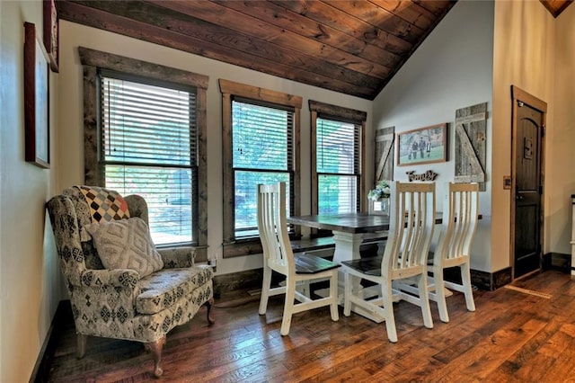 dining room featuring wood ceiling, lofted ceiling, dark wood-style flooring, and baseboards