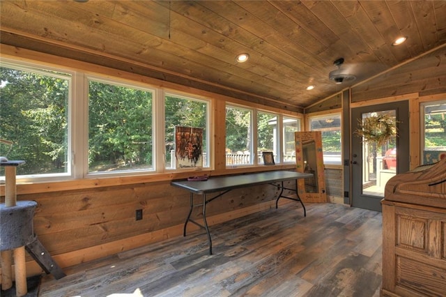 sunroom / solarium with lofted ceiling, a wealth of natural light, and wood ceiling