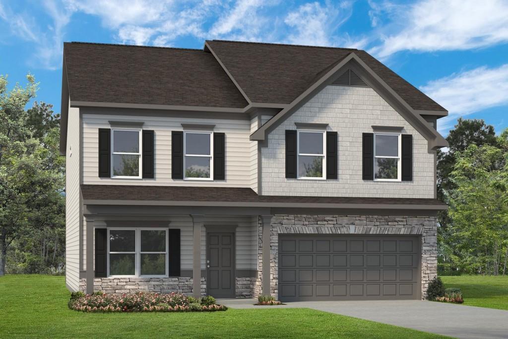 craftsman-style house with a garage and a front lawn