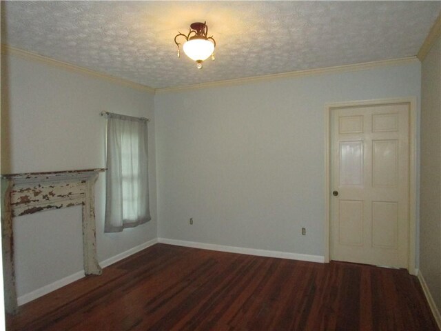 unfurnished living room featuring a textured ceiling, wood finished floors, baseboards, and ornamental molding