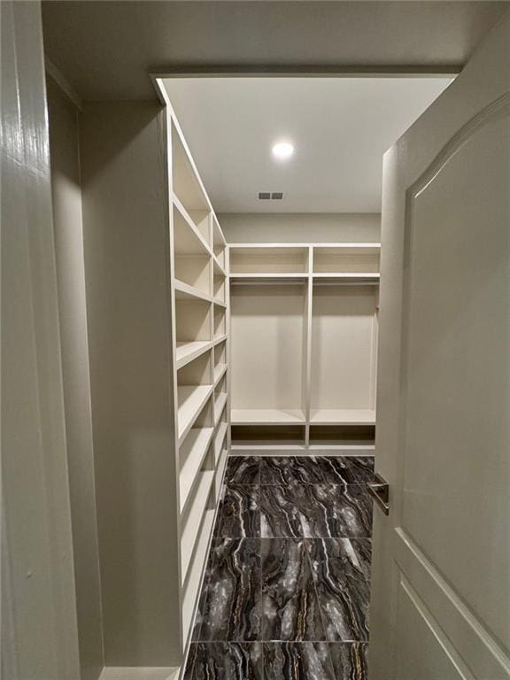 255 Carriage Station Dr, Lawrenceville, GA 30046 - spacious closet featuring marble finish flooring