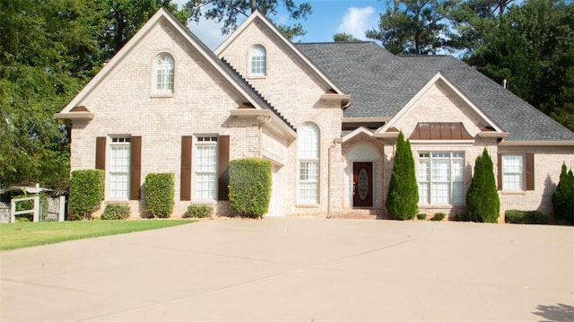 255 Carriage Station Dr, Lawrenceville, GA 30046 - view of front of home featuring brick siding and concrete driveway
