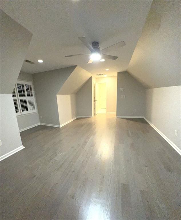 255 Carriage Station Dr, Lawrenceville, GA 30046 - bonus room featuring ceiling fan, wood finished floors, baseboards, lofted ceiling, and recessed lighting