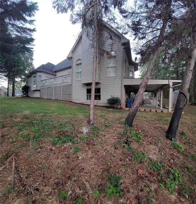 255 Carriage Station Dr, Lawrenceville, GA 30046 - rear view of house featuring a lawn