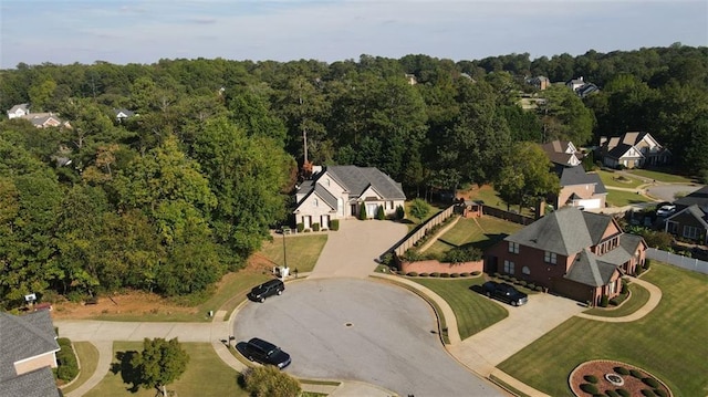 255 Carriage Station Dr, Lawrenceville, GA 30046 - aerial overview of property's location with nearby suburban area and a forest
