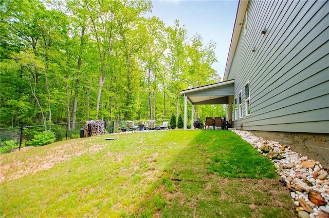 view of yard featuring fence